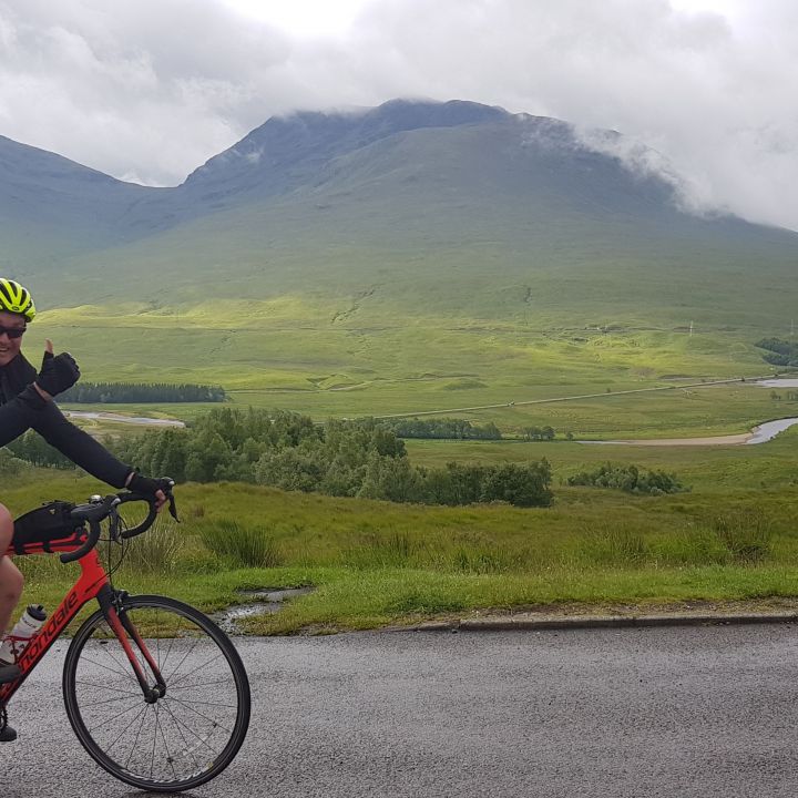 cyclist with Loch in the background