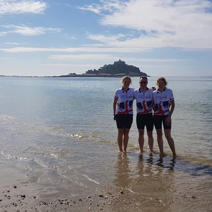 Cyclists paddling in the sea