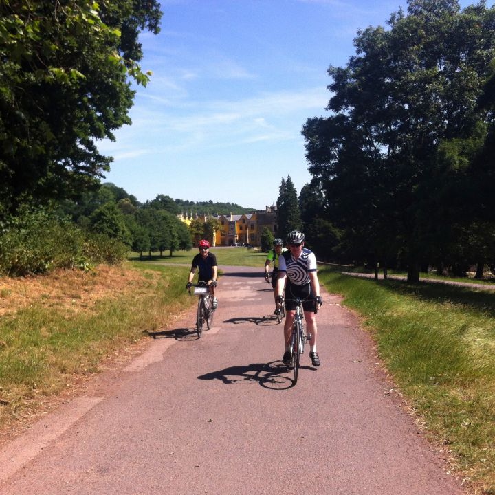 Cyclists near Ashton Park Mansion