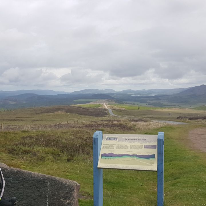 Cyclist with view of distant mountains